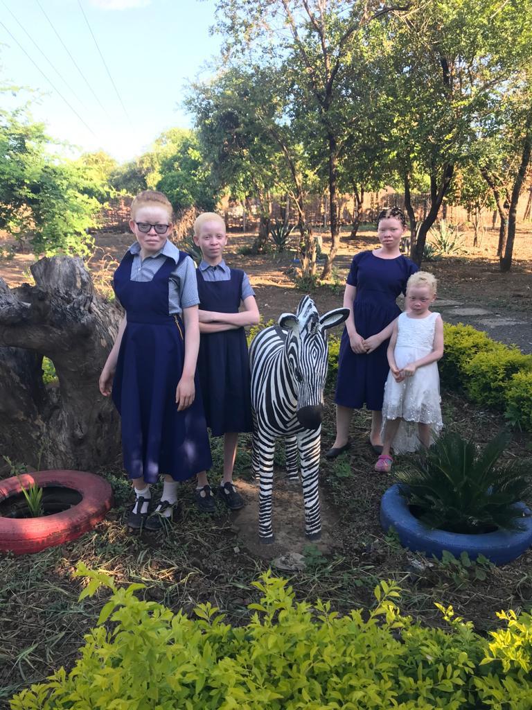 Children learning together through a Pashello inclusion programme