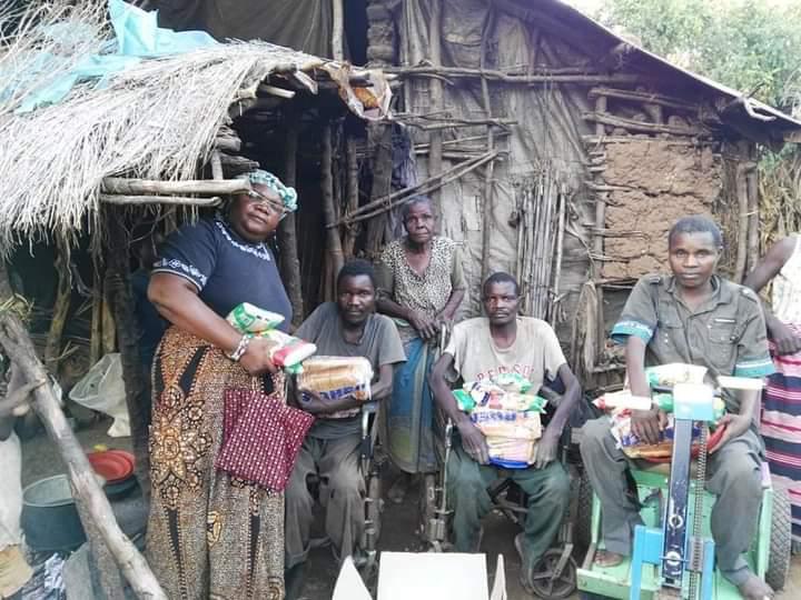 Pashello supporting community members at home in the Lower Shire